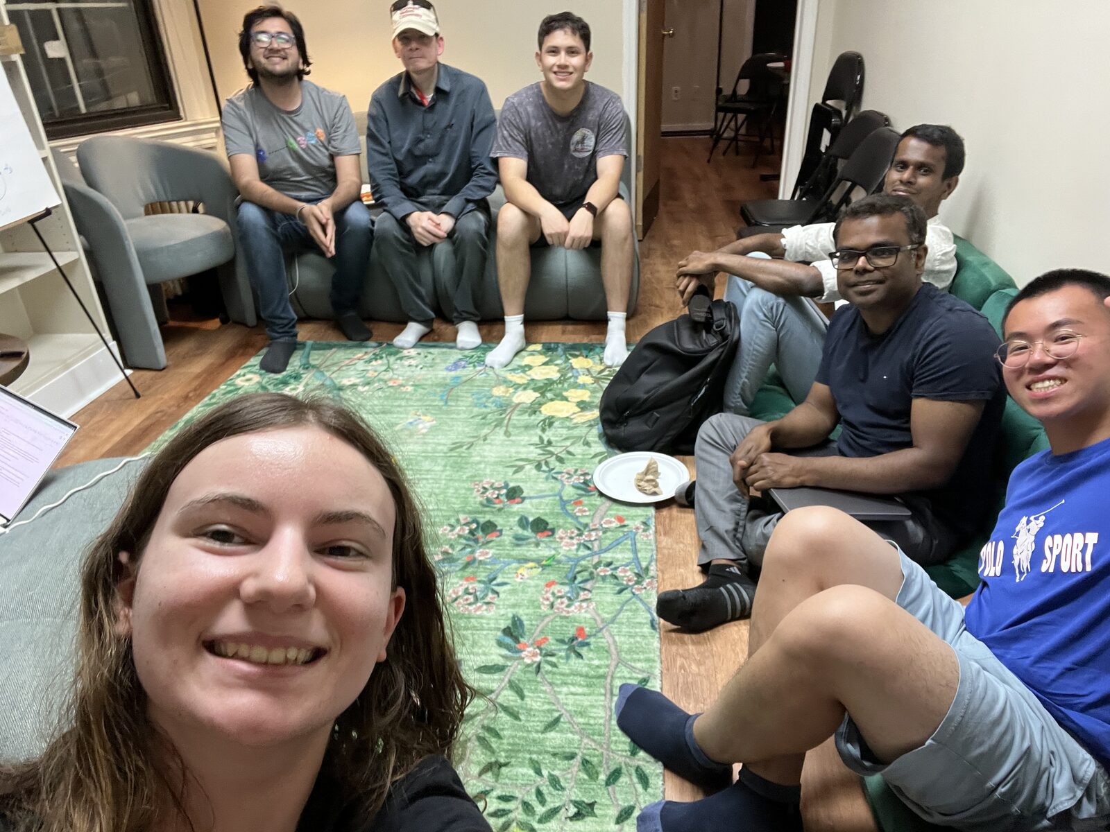 MLn Reading Club, Week 11 — the group gathered on couches around a floral rug at CASI